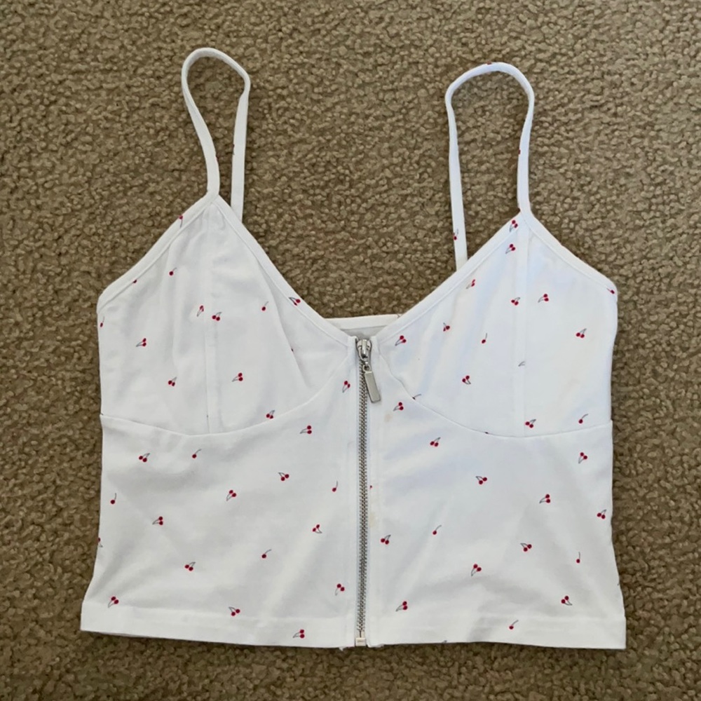 Tight Me to We crop top with functional zipper in the front.